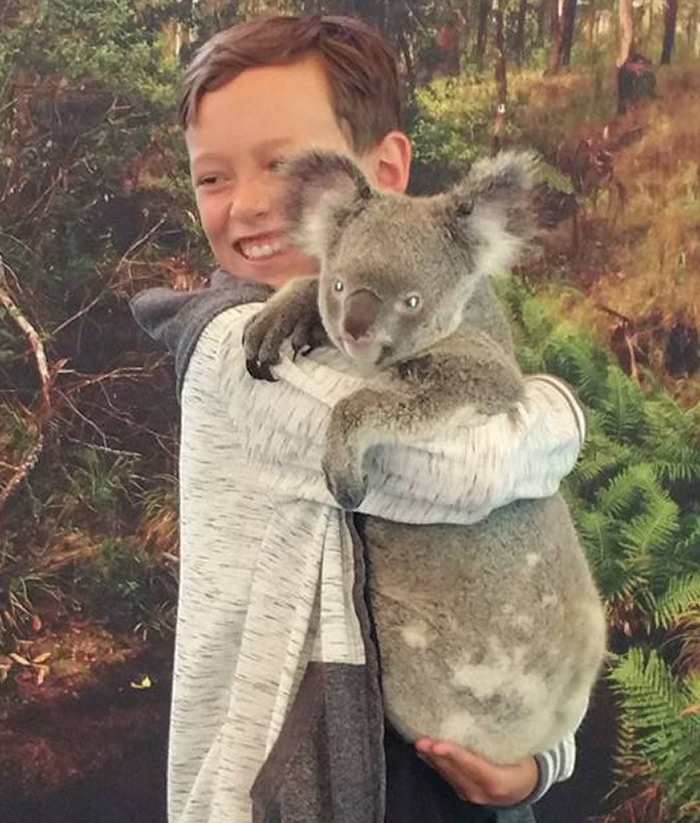 Sylas holding a Koala